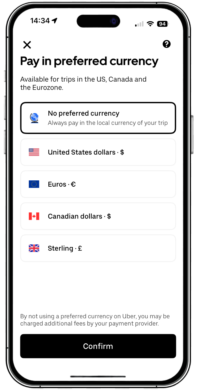 A page on the Uber app titled 'Pay in preferred currency'. Select 'No preferred currency' to pay in the local currency.