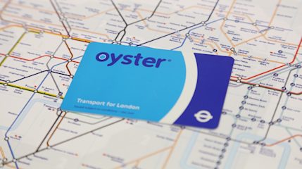 Blue Oyster card sitting on printed Tube map