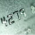 A close-up of a payment card, showing the numbers "4279".