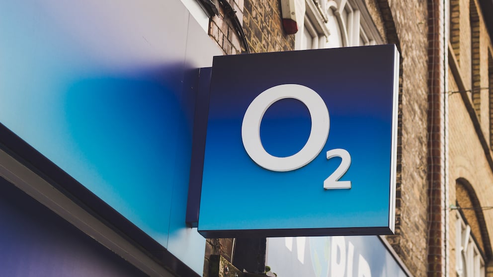Images shows O2 storefront, zoomed in on an O2 logo sign