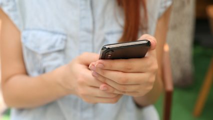 Person using smartphone image