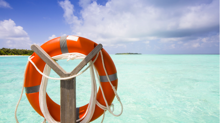 hero-homepage-tip-summer-holidays-abroad-travel-insurance-sea-beach-life-ring-buoy.png
