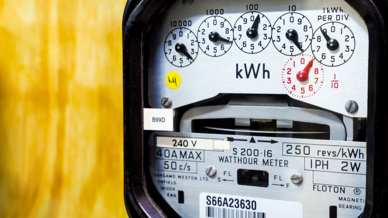 A dial electricity meter, showing usage in kilowatt hours (kWh).