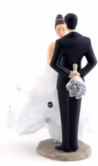 Bride and groom cake figurines.