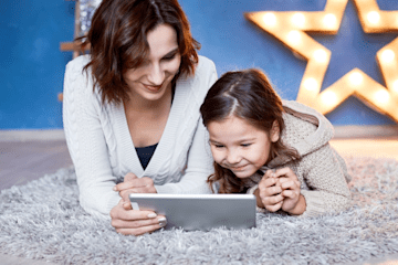 parent and child using tablet image