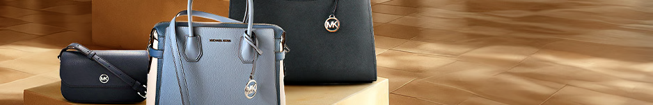 Trois sacs chics Michael Kors en vente privée.