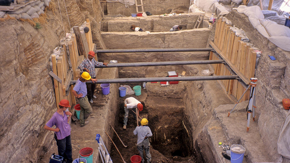 Archeologists at a dig site