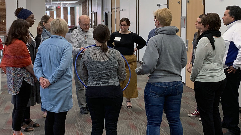 A group activity in a hallway