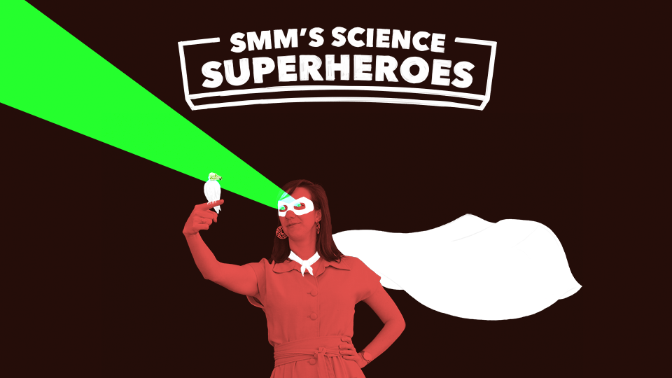 Dr. Catherine Early in a superhero outfit with the words SMM'S Science Superheroes