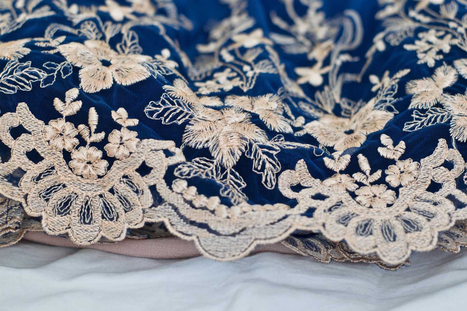 Detailed view of an ornate fabric. 