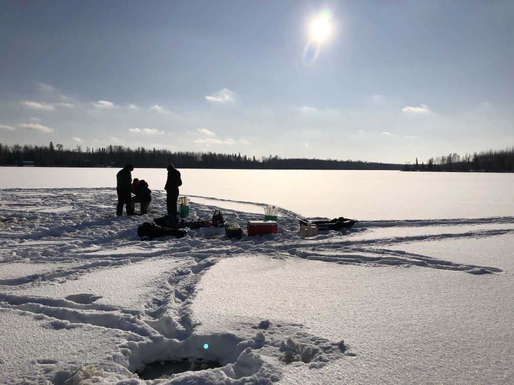 Researchers prepare to collect a core during the winter.