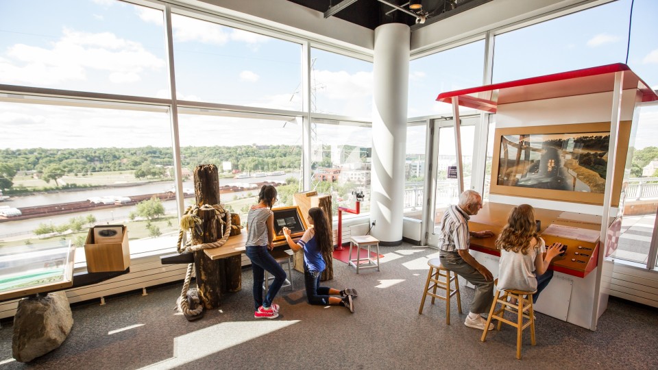 Adults and children in Mississippi river gallery