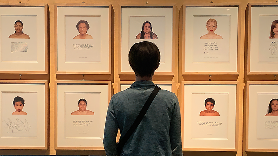 A person looking at photographs of faces in RACE: Are We So Different?