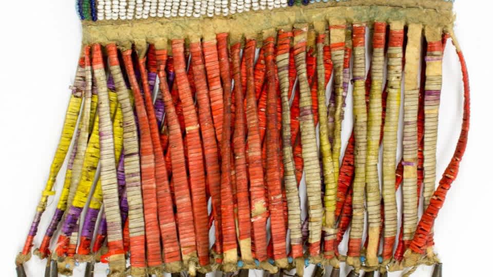 Red, yellow, purple, and tan beadwork