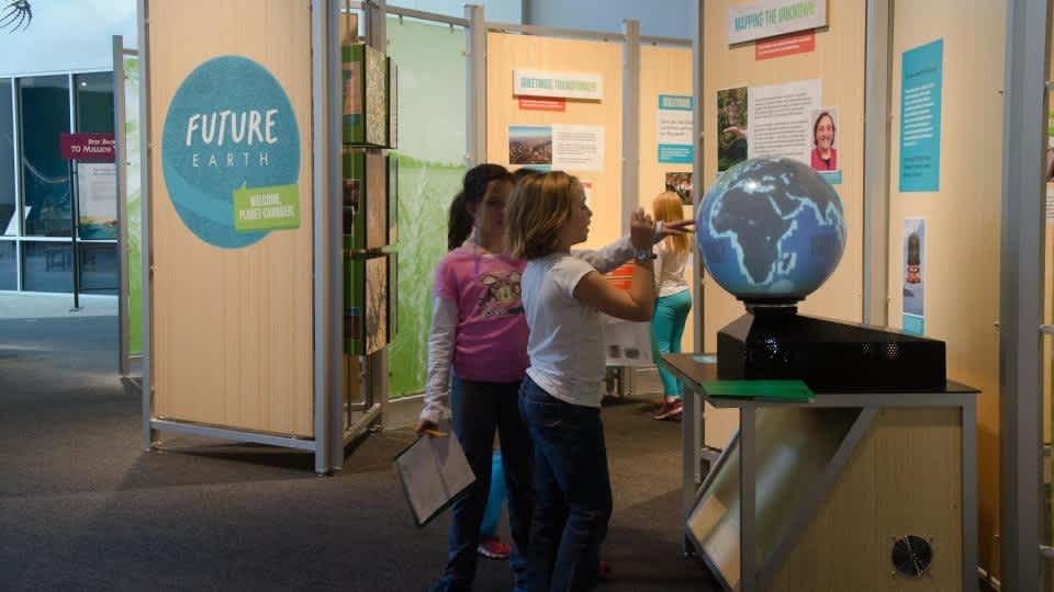 Young visitors playing in the Future Earth exhibit 