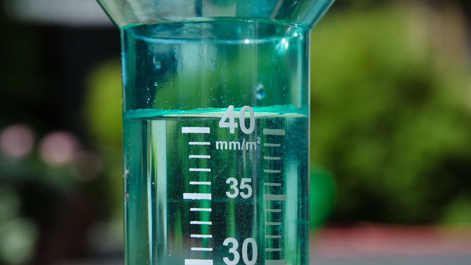 Rain gauge with water measuring 40 millimeters per square meter
