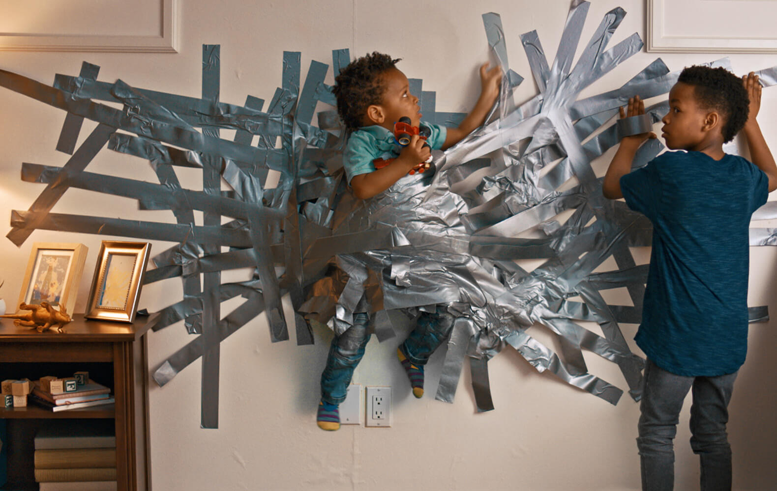 kids playing with duct tape