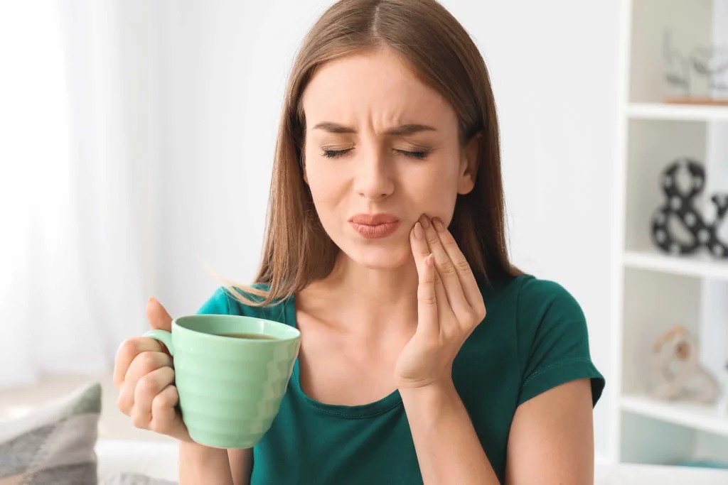 What feels like a small “zing” during chai may actually be the beginning of tooth decay