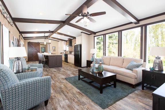 Love open floor plans? Then you'll love the Dewey with its tall windows flooding the living room with natural lights, exposed-beam ceiling, and roomy kitchen.