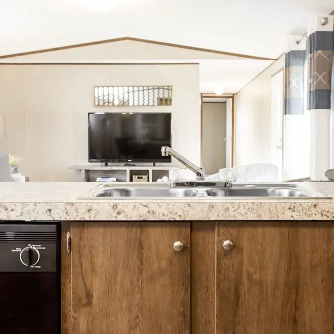 Whether a big game is on or you're hosting some family and friends, you'll appreciate the open concept between the kitchen and living room found in the Glory. 
