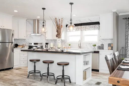 From the built-in shelving to the faux marble backsplash, each detail in The Cascade kitchen contributes to a gorgeous living space that's made with you in mind.