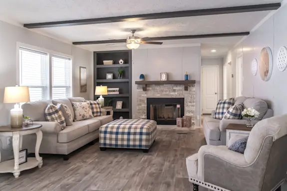 The Fusion 32B features a beautiful stone fireplace and built-in shelving.