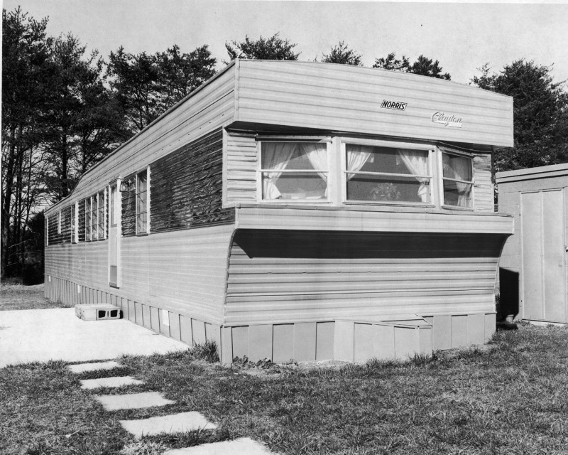 Old black and white Clayton mobile home.
