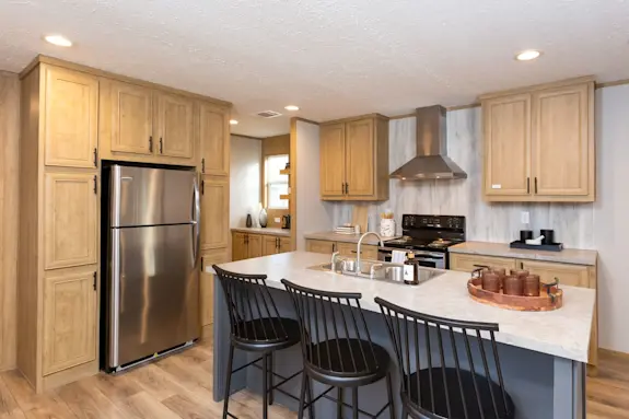 Check out the kitchen and coffee bar in the Tuscany mobile/manufactured/modular home.