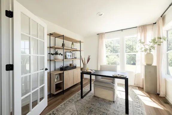 The [model name] has a beautiful flex room with lots of natural light, making it ideal for a sunroom, art studio, home gym and more.