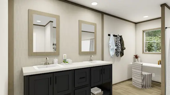 The [model name] features a double sinks and an open nook to put a makeup vanity or laundry hamper there.