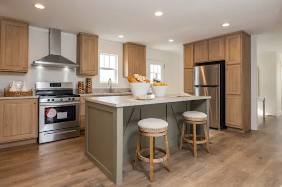 The [model name] features a flex space and a large kitchen.