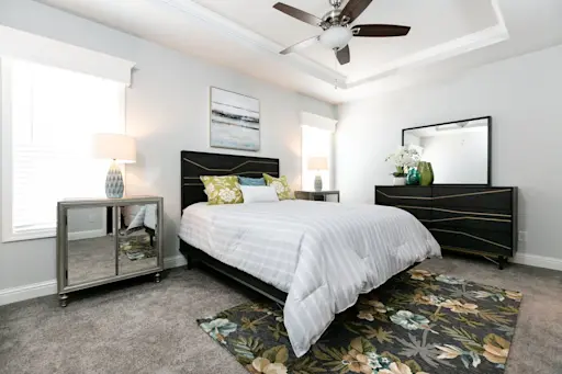 Make room for the spacious Coronado 3766A on your list of dream homes! You'll love the classic primary bedroom especially with its plush carpet, tray ceilings and window cornices.