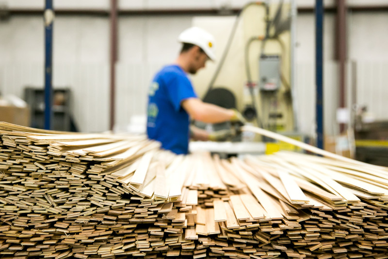 A bulk of wood in a manufactured home building facility.