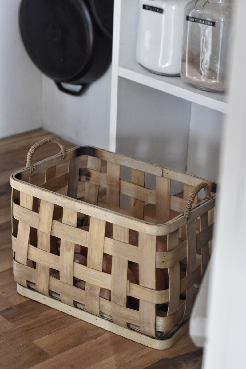 wooden basket in farmhouse pantry