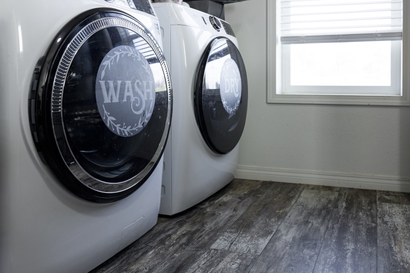 A washer and dryer in a laundry room