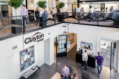 People walking around Clayton’s design space on the top and bottom floors.