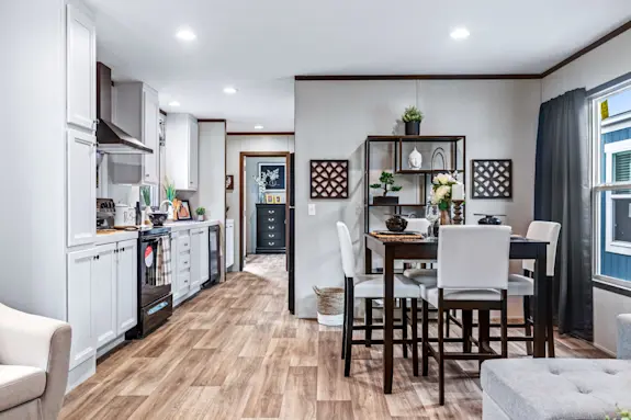 The Desire features an open floor plan with a dining area and a flex room option.