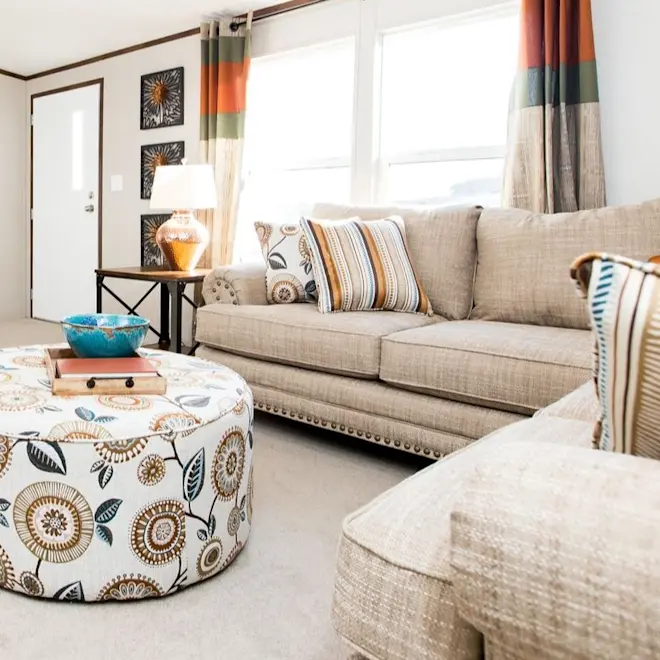 Recreate this look with great color combos in decor and furniture to highlight this fabulous living space, plush carpet, large windows and interior trim in the Marvel 4 home.
