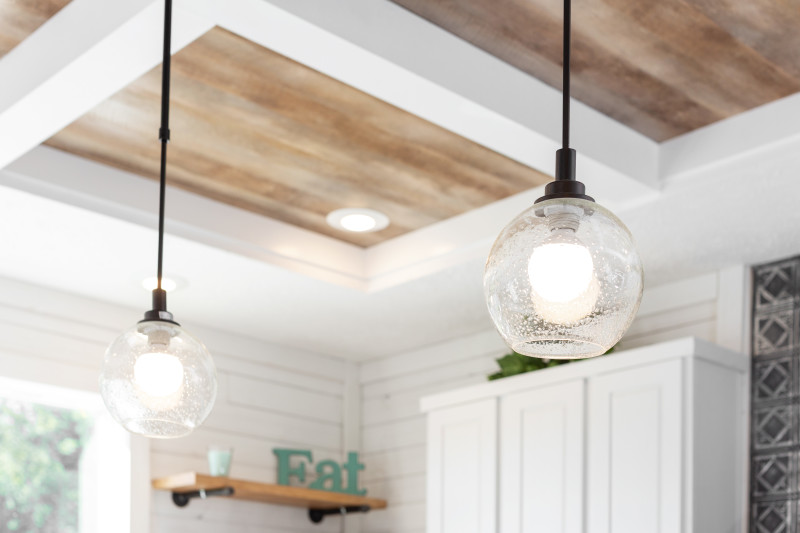 Glass pendant lighting in the kitchen of a Clayton Built® home.