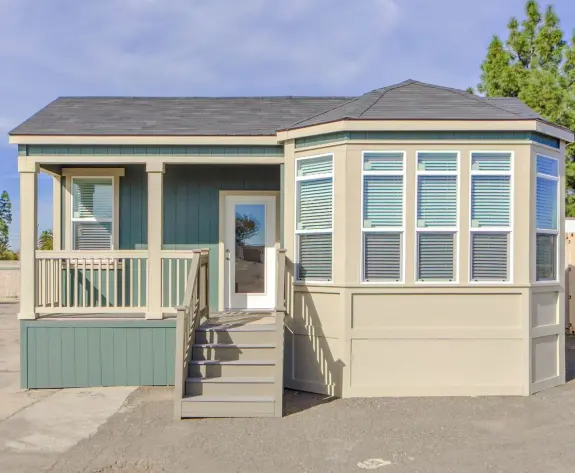 The Morro Bay 27523-B has a gorgeous bungalow style to it with its bay windows and front porch.