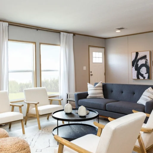 Make the [model name] your own with an open living room set up across from large double windows.