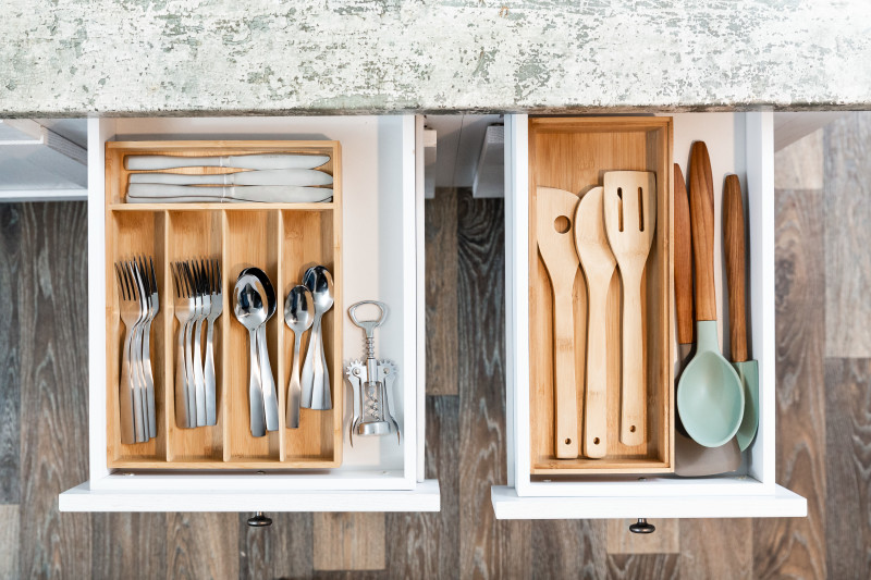 Organized kitchen drawers with utensil separators