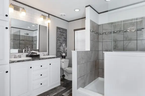 The [model name] features a walk-in shower and built-in storage.
