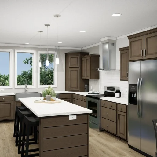 The kitchen in [model name] features a large island and stainless steel appliances.