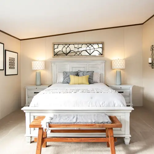 Recharge with plenty of natural light from two windows in the Triumph primary bedroom.