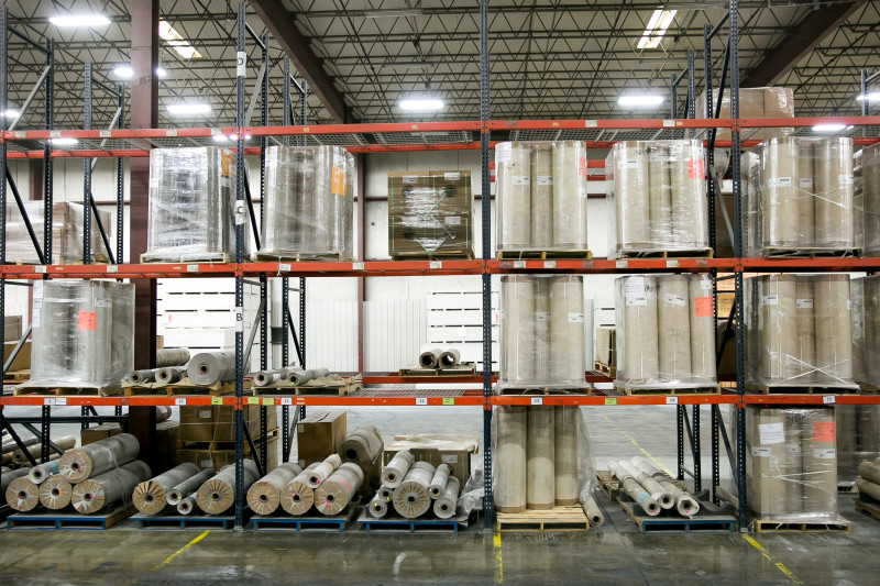 Materials stacked inside a manufactured home building facility.