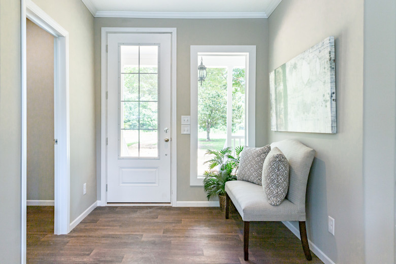 Entryway of a Clayton Built® home featuring a foyer seating area
