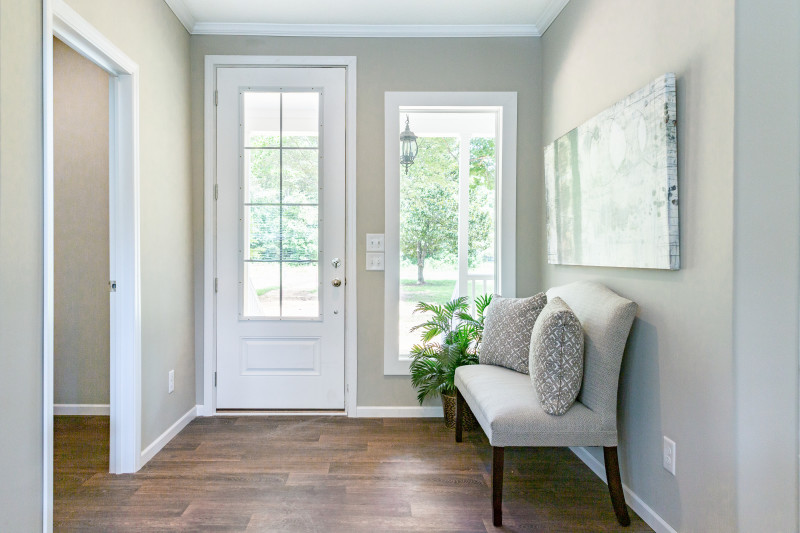 Entryway of a Clayton Built® home featuring a foyer seating area