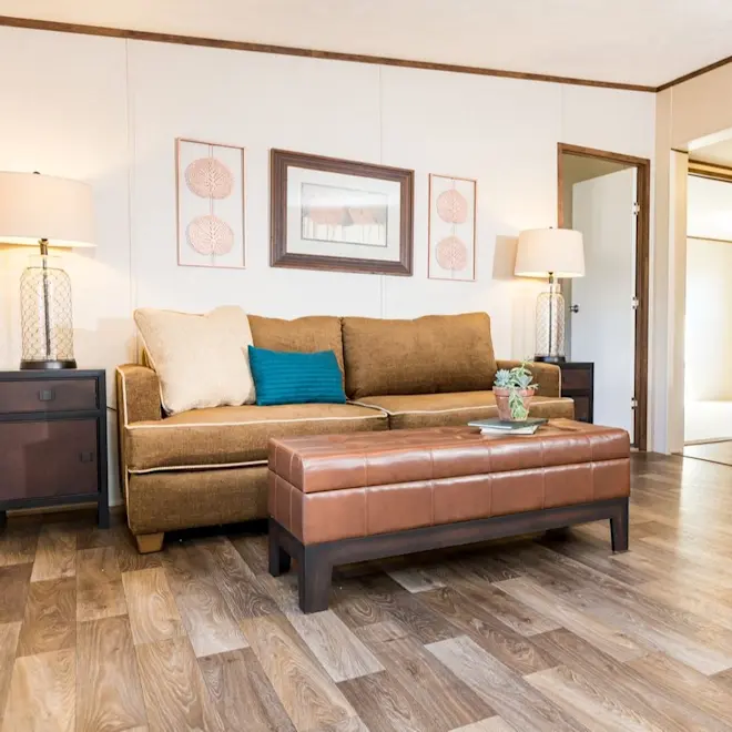Your whole family will enjoy this spacious den from our Marvel 4 home. With laminate wood floors, great color combos and plenty of space, this family den is a perfect place for creating lasting memories!