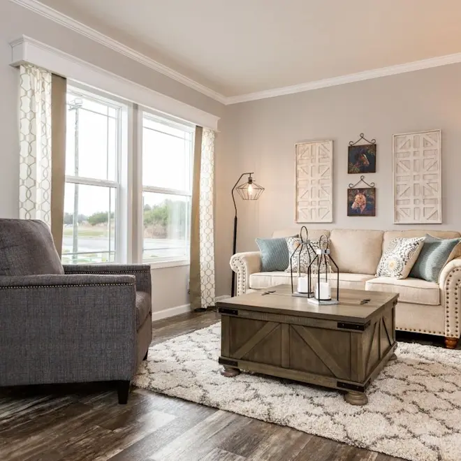 What a beautiful and stylish modern living room from our Classic 56D home. This living room utilizes complementary colors and natural light to make this space your whole family will enjoy.